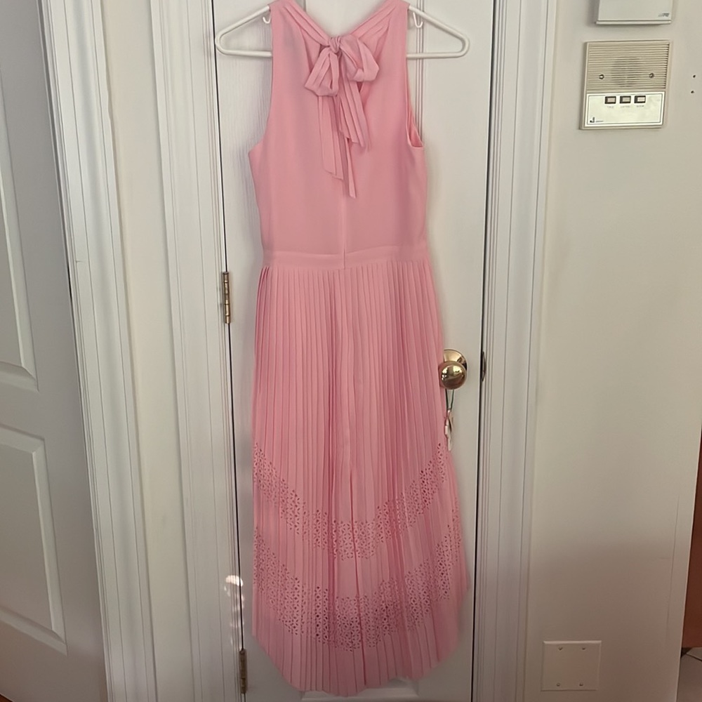 Banana republic pink strapless flowy dress w printed cut outs and bow in back